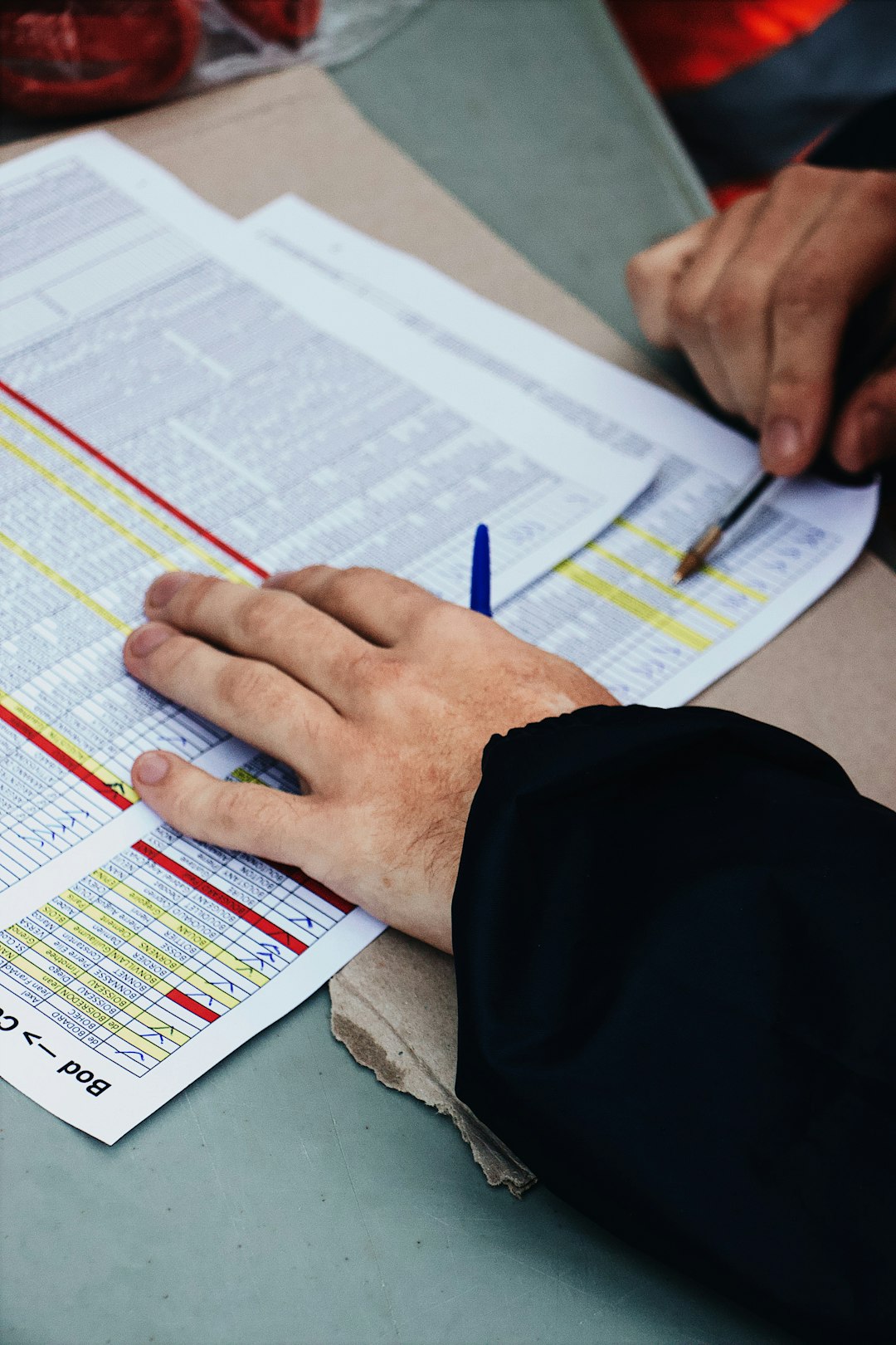 services-02 persons-hand-on-two-stack-of-paper-a7bbjzmdqk4