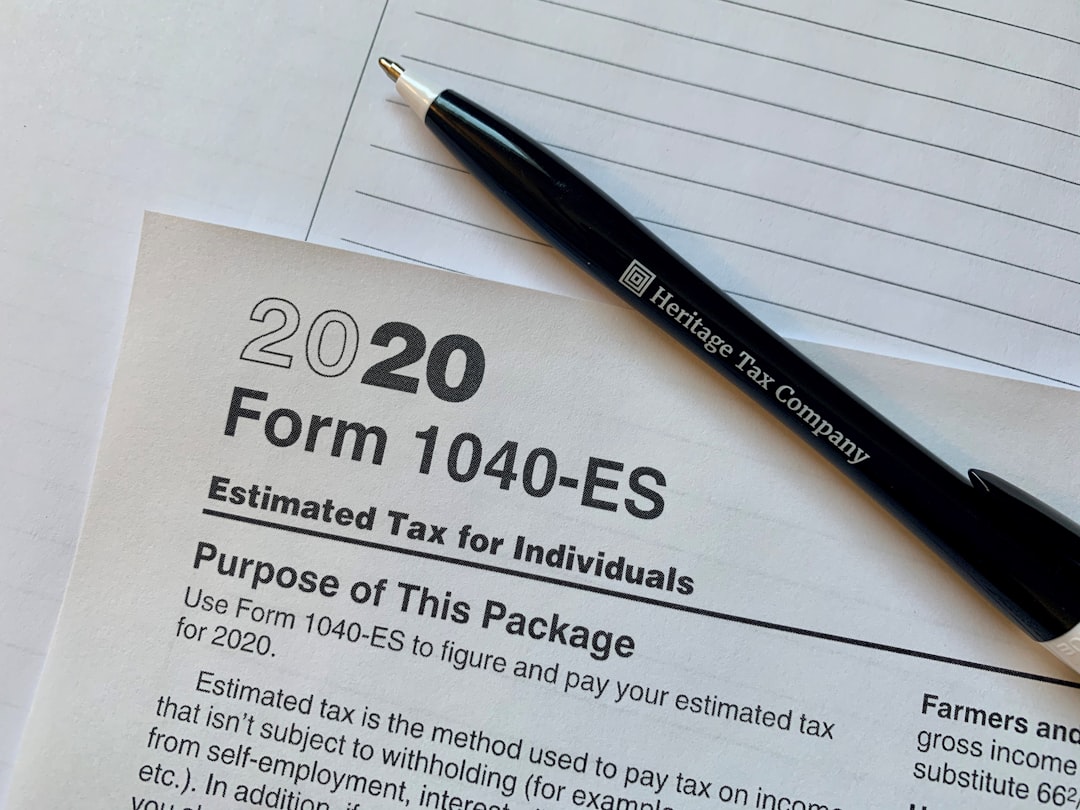 get-in-touch a-pen-sitting-on-top-of-a-tax-form-ankrawvmbru